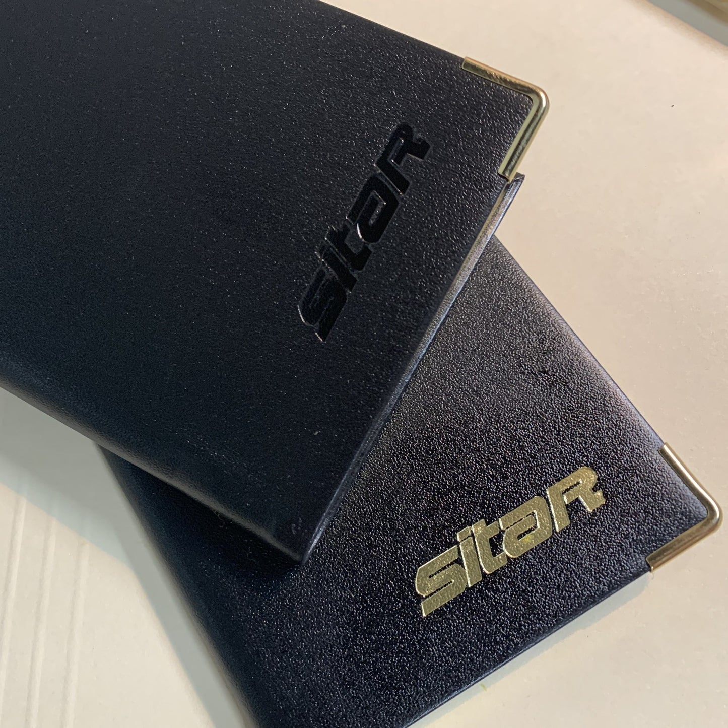 Sitar Logo beautifully embossed on leather