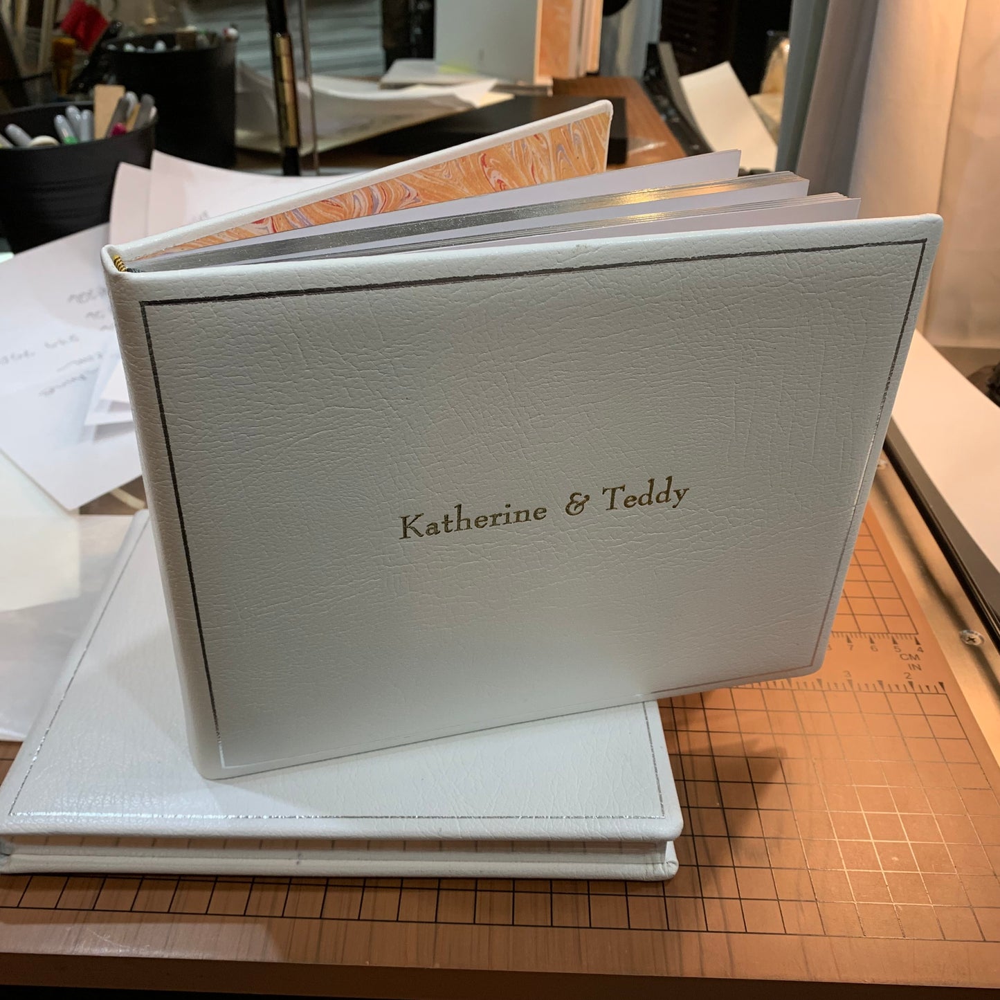 Classic White Leather Wedding Guest Book | Katherine & Teddy | 7 by 9 Inches Horizontal | Buffalo Embossed Calf Leather | GUESTS